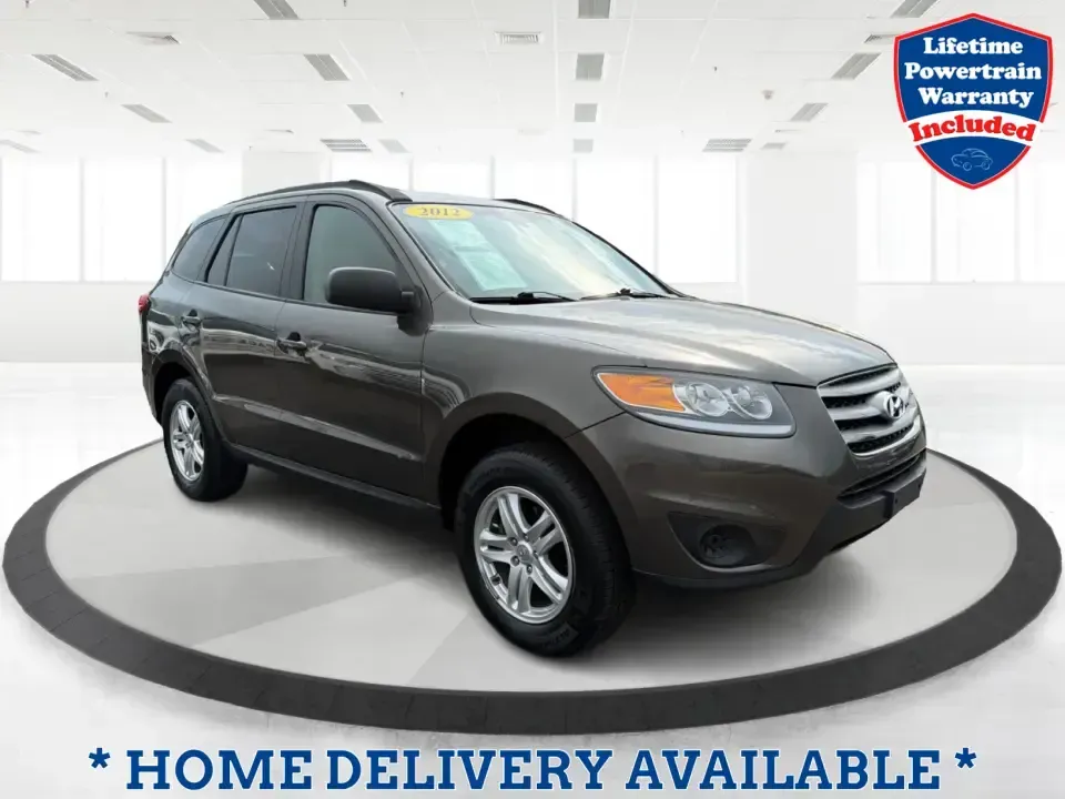 2012 Hyundai Santa Fe GLS 2.4 FWD (5XYZG3AB8CG) with an 2.4L L4 DOHC 16V engine, 6-Speed Automatic transmission, located at 8750 N County Rd 25A, Piqua, OH, 45356, (937) 908-9800, 40.164391, -84.232513 - Picture an easy weekend getaway: you load the cooler, fold the second-row seats for extra gear, and head out of Piqua toward Indian Lake or a day trip through the Miami Valley-without needing a giant SUV. This 2012 Hyundai Santa Fe GLS 2.4 is a practical, five-passenger SUV that fits real life, whet- Photo#0