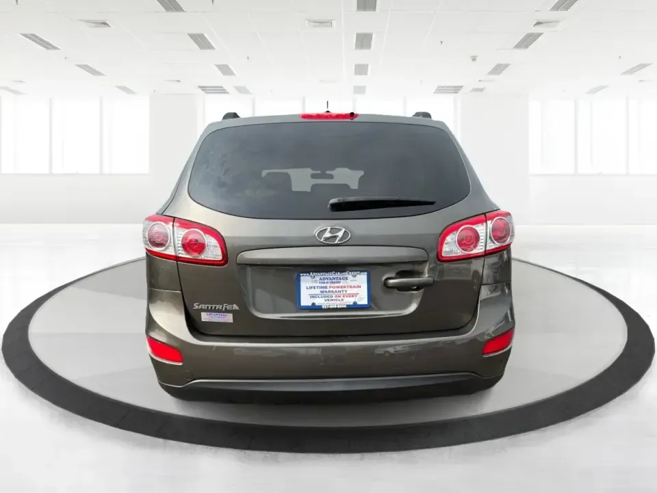 2012 Hyundai Santa Fe GLS 2.4 FWD (5XYZG3AB8CG) with an 2.4L L4 DOHC 16V engine, 6-Speed Automatic transmission, located at 8750 N County Rd 25A, Piqua, OH, 45356, (937) 908-9800, 40.164391, -84.232513 - Picture an easy weekend getaway: you load the cooler, fold the second-row seats for extra gear, and head out of Piqua toward Indian Lake or a day trip through the Miami Valley-without needing a giant SUV. This 2012 Hyundai Santa Fe GLS 2.4 is a practical, five-passenger SUV that fits real life, whet- Photo#3