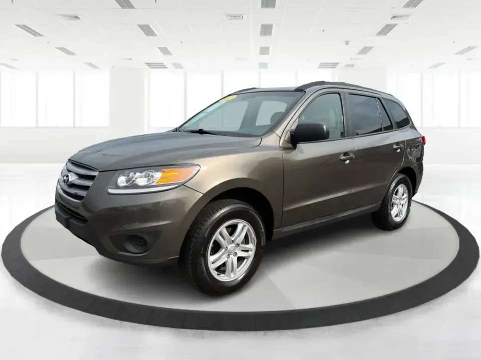 2012 Hyundai Santa Fe GLS 2.4 FWD (5XYZG3AB8CG) with an 2.4L L4 DOHC 16V engine, 6-Speed Automatic transmission, located at 8750 N County Rd 25A, Piqua, OH, 45356, (937) 908-9800, 40.164391, -84.232513 - Picture an easy weekend getaway: you load the cooler, fold the second-row seats for extra gear, and head out of Piqua toward Indian Lake or a day trip through the Miami Valley-without needing a giant SUV. This 2012 Hyundai Santa Fe GLS 2.4 is a practical, five-passenger SUV that fits real life, whet- Photo#8