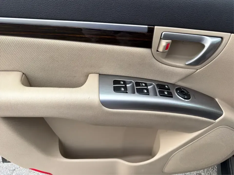 2012 Hyundai Santa Fe GLS 2.4 FWD (5XYZG3AB8CG) with an 2.4L L4 DOHC 16V engine, 6-Speed Automatic transmission, located at 8750 N County Rd 25A, Piqua, OH, 45356, (937) 908-9800, 40.164391, -84.232513 - Picture an easy weekend getaway: you load the cooler, fold the second-row seats for extra gear, and head out of Piqua toward Indian Lake or a day trip through the Miami Valley-without needing a giant SUV. This 2012 Hyundai Santa Fe GLS 2.4 is a practical, five-passenger SUV that fits real life, whet- Photo#17