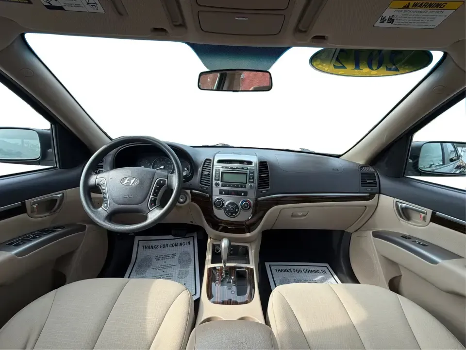 2012 Hyundai Santa Fe GLS 2.4 FWD (5XYZG3AB8CG) with an 2.4L L4 DOHC 16V engine, 6-Speed Automatic transmission, located at 8750 N County Rd 25A, Piqua, OH, 45356, (937) 908-9800, 40.164391, -84.232513 - Picture an easy weekend getaway: you load the cooler, fold the second-row seats for extra gear, and head out of Piqua toward Indian Lake or a day trip through the Miami Valley-without needing a giant SUV. This 2012 Hyundai Santa Fe GLS 2.4 is a practical, five-passenger SUV that fits real life, whet- Photo#20