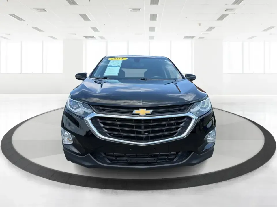 2018 Chevrolet Equinox LT 2WD (2GNAXJEV5J6) with an 1.5L L4 DIR DOHC 16V TURBO engine, 6A transmission, located at 8750 N County Rd 25A, Piqua, OH, 45356, (937) 908-9800, 40.164391, -84.232513 - Pack up the family for a weekend at Indian Lake, handle the daily commute down I-75, or run stress-free errands between Piqua and Troy-this 2018 Chevrolet Equinox LT 2WD is the kind of practical, comfortable SUV that fits real life. With its Mosaic Black Metallic exterior, versatile cargo space, and- Photo#7