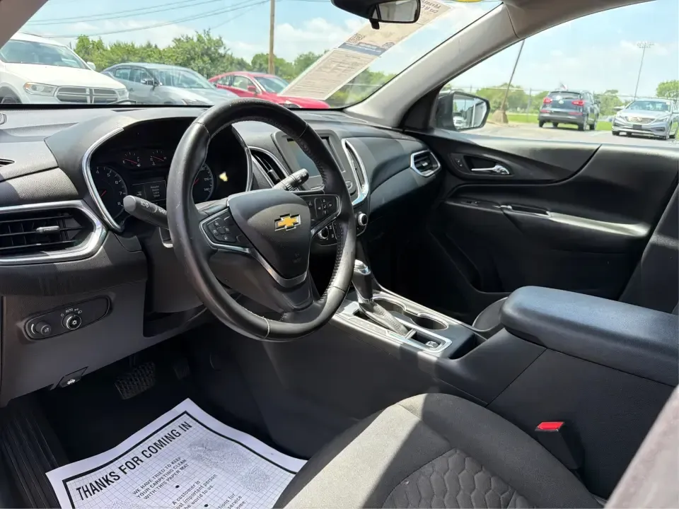 2018 Chevrolet Equinox LT 2WD (2GNAXJEV5J6) with an 1.5L L4 DIR DOHC 16V TURBO engine, 6A transmission, located at 8750 N County Rd 25A, Piqua, OH, 45356, (937) 908-9800, 40.164391, -84.232513 - Pack up the family for a weekend at Indian Lake, handle the daily commute down I-75, or run stress-free errands between Piqua and Troy-this 2018 Chevrolet Equinox LT 2WD is the kind of practical, comfortable SUV that fits real life. With its Mosaic Black Metallic exterior, versatile cargo space, and- Photo#9