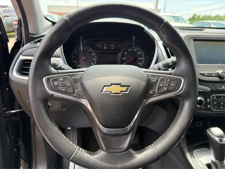 2018 Chevrolet Equinox LT 2WD (2GNAXJEV5J6) with an 1.5L L4 DIR DOHC 16V TURBO engine, 6A transmission, located at 8750 N County Rd 25A, Piqua, OH, 45356, (937) 908-9800, 40.164391, -84.232513 - Pack up the family for a weekend at Indian Lake, handle the daily commute down I-75, or run stress-free errands between Piqua and Troy-this 2018 Chevrolet Equinox LT 2WD is the kind of practical, comfortable SUV that fits real life. With its Mosaic Black Metallic exterior, versatile cargo space, and- Photo#16