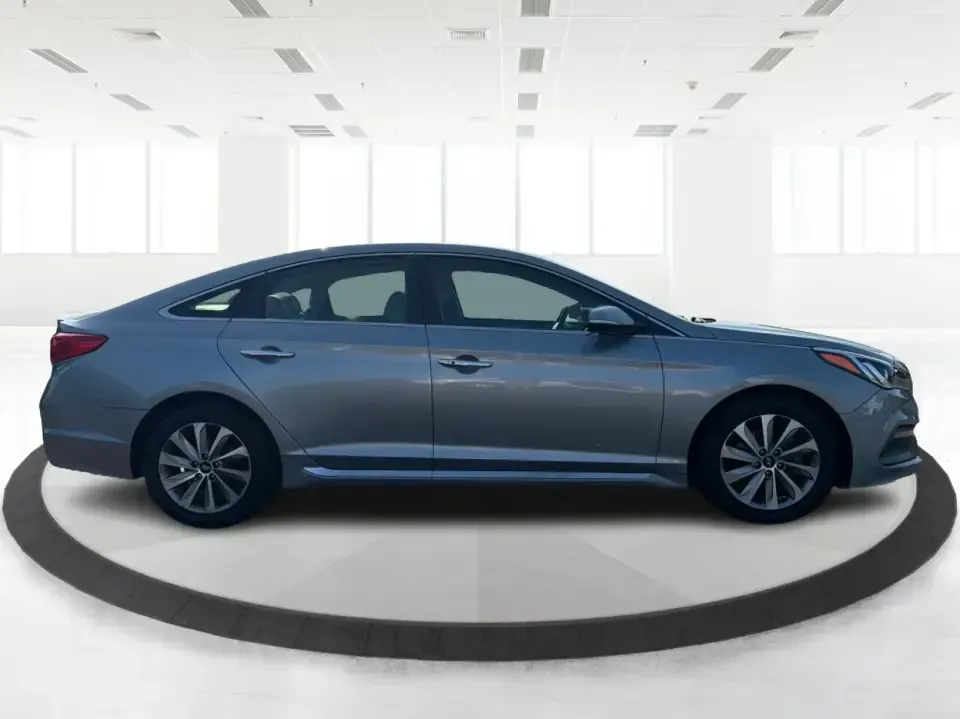 2015 Hyundai Sonata Sport (5NPE34AFXFH) with an 2.4L L4 DOHC 16V engine, 6-Speed Automatic transmission, located at 880 E. National Road, Vandalia, OH, 45377, (937) 908-9800, 39.891918, -84.183594 - Need a comfortable, sporty commuter that can handle daily I75 runs, school drop-offs, and weekend trips to the Dayton area without blowing your budget? This **2015 Hyundai Sonata Sport** in **Shale Gray Metallic** brings the kind of roomy, tech-friendly sedan experience that fits real life in **Vand- Photo#1
