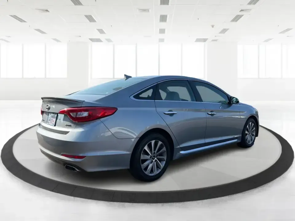 2015 Hyundai Sonata Sport (5NPE34AFXFH) with an 2.4L L4 DOHC 16V engine, 6-Speed Automatic transmission, located at 880 E. National Road, Vandalia, OH, 45377, (937) 908-9800, 39.891918, -84.183594 - Need a comfortable, sporty commuter that can handle daily I75 runs, school drop-offs, and weekend trips to the Dayton area without blowing your budget? This **2015 Hyundai Sonata Sport** in **Shale Gray Metallic** brings the kind of roomy, tech-friendly sedan experience that fits real life in **Vand- Photo#2