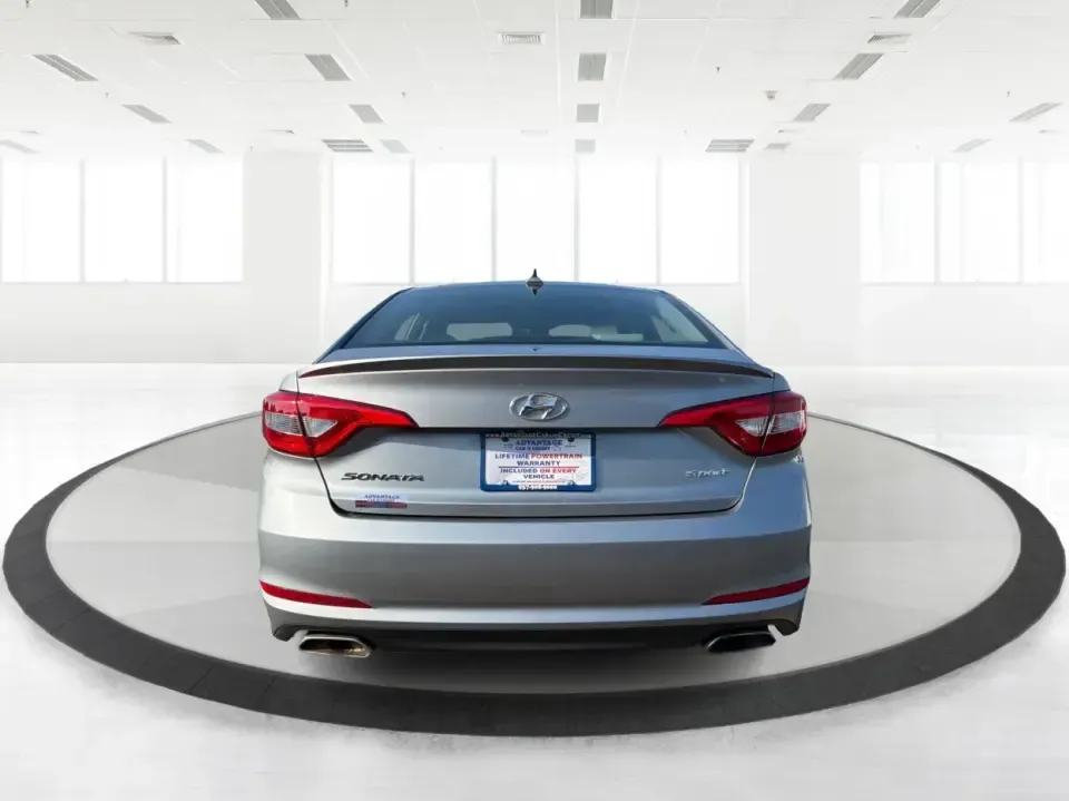 2015 Hyundai Sonata Sport (5NPE34AFXFH) with an 2.4L L4 DOHC 16V engine, 6-Speed Automatic transmission, located at 880 E. National Road, Vandalia, OH, 45377, (937) 908-9800, 39.891918, -84.183594 - Need a comfortable, sporty commuter that can handle daily I75 runs, school drop-offs, and weekend trips to the Dayton area without blowing your budget? This **2015 Hyundai Sonata Sport** in **Shale Gray Metallic** brings the kind of roomy, tech-friendly sedan experience that fits real life in **Vand- Photo#3