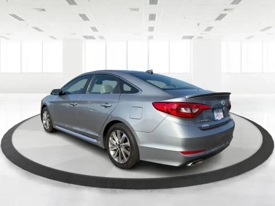 2015 Hyundai Sonata Sport (5NPE34AFXFH) with an 2.4L L4 DOHC 16V engine, 6-Speed Automatic transmission, located at 880 E. National Road, Vandalia, OH, 45377, (937) 908-9800, 39.891918, -84.183594 - Need a comfortable, sporty commuter that can handle daily I75 runs, school drop-offs, and weekend trips to the Dayton area without blowing your budget? This **2015 Hyundai Sonata Sport** in **Shale Gray Metallic** brings the kind of roomy, tech-friendly sedan experience that fits real life in **Vand- Photo#4