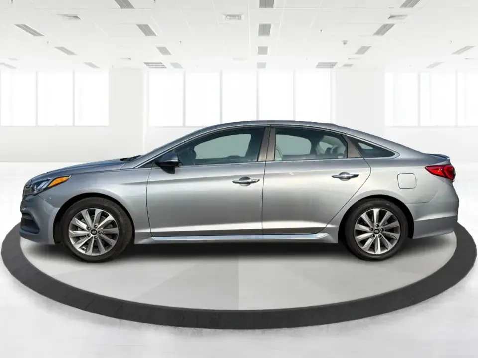 2015 Hyundai Sonata Sport (5NPE34AFXFH) with an 2.4L L4 DOHC 16V engine, 6-Speed Automatic transmission, located at 880 E. National Road, Vandalia, OH, 45377, (937) 908-9800, 39.891918, -84.183594 - Need a comfortable, sporty commuter that can handle daily I75 runs, school drop-offs, and weekend trips to the Dayton area without blowing your budget? This **2015 Hyundai Sonata Sport** in **Shale Gray Metallic** brings the kind of roomy, tech-friendly sedan experience that fits real life in **Vand- Photo#5
