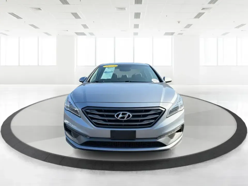 2015 Hyundai Sonata Sport (5NPE34AFXFH) with an 2.4L L4 DOHC 16V engine, 6-Speed Automatic transmission, located at 880 E. National Road, Vandalia, OH, 45377, (937) 908-9800, 39.891918, -84.183594 - Need a comfortable, sporty commuter that can handle daily I75 runs, school drop-offs, and weekend trips to the Dayton area without blowing your budget? This **2015 Hyundai Sonata Sport** in **Shale Gray Metallic** brings the kind of roomy, tech-friendly sedan experience that fits real life in **Vand- Photo#7