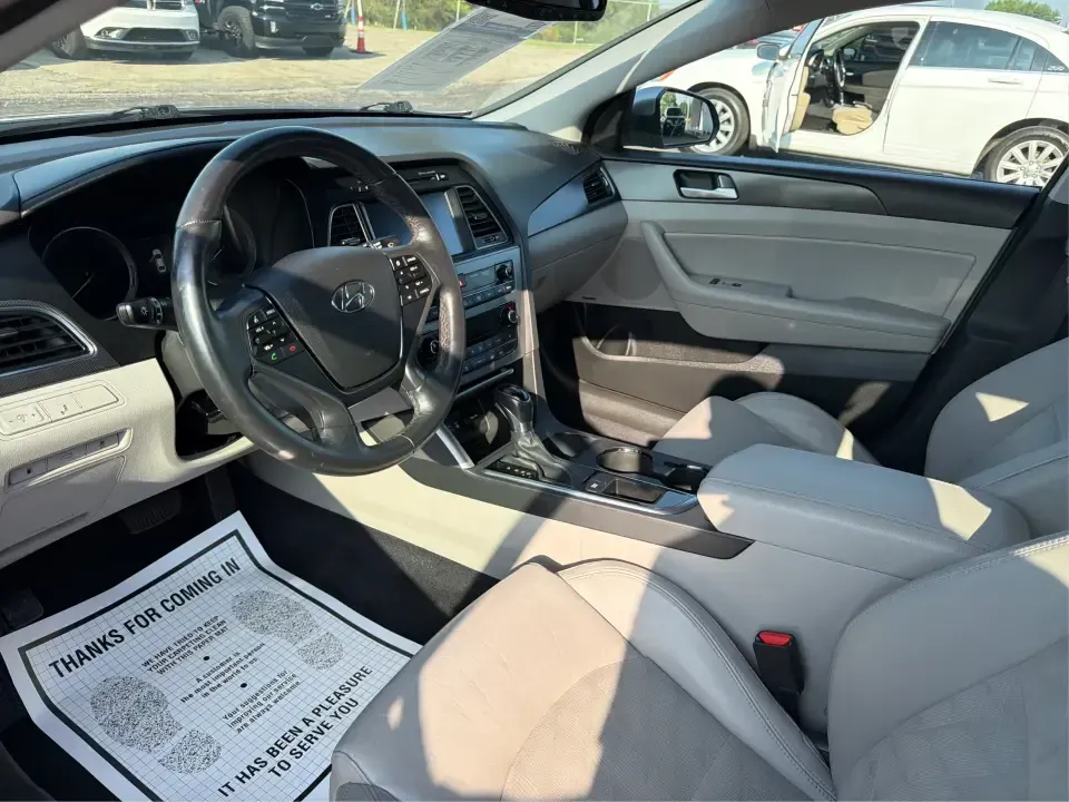 2015 Hyundai Sonata Sport (5NPE34AFXFH) with an 2.4L L4 DOHC 16V engine, 6-Speed Automatic transmission, located at 880 E. National Road, Vandalia, OH, 45377, (937) 908-9800, 39.891918, -84.183594 - Need a comfortable, sporty commuter that can handle daily I75 runs, school drop-offs, and weekend trips to the Dayton area without blowing your budget? This **2015 Hyundai Sonata Sport** in **Shale Gray Metallic** brings the kind of roomy, tech-friendly sedan experience that fits real life in **Vand- Photo#9