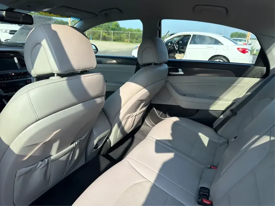 2015 Hyundai Sonata Sport (5NPE34AFXFH) with an 2.4L L4 DOHC 16V engine, 6-Speed Automatic transmission, located at 880 E. National Road, Vandalia, OH, 45377, (937) 908-9800, 39.891918, -84.183594 - Need a comfortable, sporty commuter that can handle daily I75 runs, school drop-offs, and weekend trips to the Dayton area without blowing your budget? This **2015 Hyundai Sonata Sport** in **Shale Gray Metallic** brings the kind of roomy, tech-friendly sedan experience that fits real life in **Vand- Photo#10