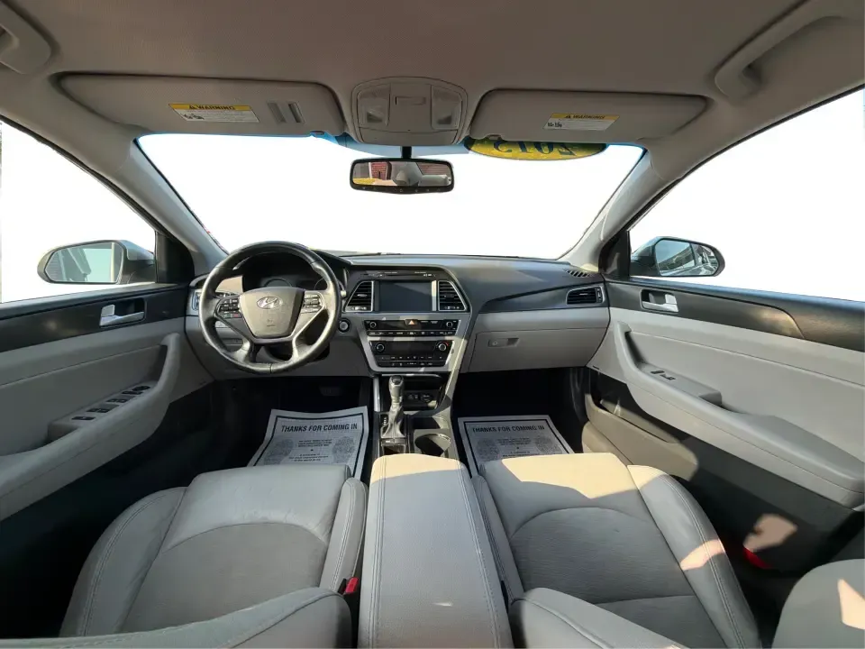2015 Hyundai Sonata Sport (5NPE34AFXFH) with an 2.4L L4 DOHC 16V engine, 6-Speed Automatic transmission, located at 880 E. National Road, Vandalia, OH, 45377, (937) 908-9800, 39.891918, -84.183594 - Need a comfortable, sporty commuter that can handle daily I75 runs, school drop-offs, and weekend trips to the Dayton area without blowing your budget? This **2015 Hyundai Sonata Sport** in **Shale Gray Metallic** brings the kind of roomy, tech-friendly sedan experience that fits real life in **Vand- Photo#22