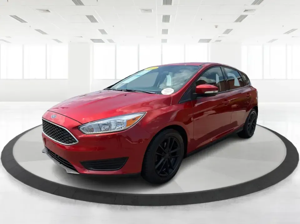 2018 Ford Focus SE (1FADP3K27JL) with an 2L I-4 gasoline direct injection engine, Automatic transmission, located at 4508 South Dixie Dr, Moraine, OH, 45439, (937) 908-9800, 39.689976, -84.218452 - Need a practical, fun-to-drive hatchback for the daily commute down South Dixie Drive, quick errands near Dayton Mall, or an easy weekend escape to Carillon Historical Park? This 2018 Ford Focus SE in eye-catching Hot Pepper Red Metallic Tinted Clearcoat fits real life in Moraine, Ohio-compact enoug- Photo#8