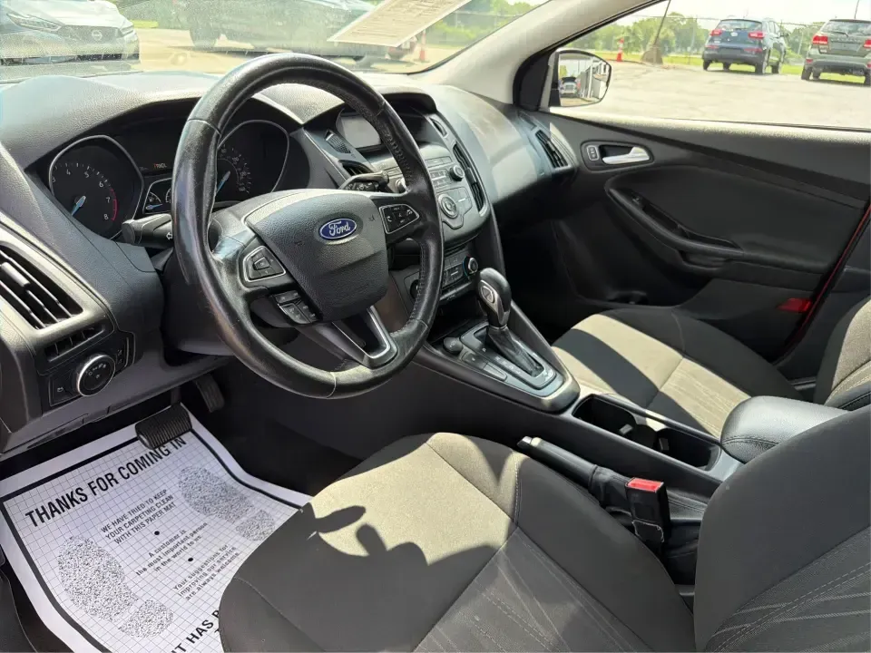 2018 Ford Focus SE (1FADP3K27JL) with an 2L I-4 gasoline direct injection engine, Automatic transmission, located at 4508 South Dixie Dr, Moraine, OH, 45439, (937) 908-9800, 39.689976, -84.218452 - Need a practical, fun-to-drive hatchback for the daily commute down South Dixie Drive, quick errands near Dayton Mall, or an easy weekend escape to Carillon Historical Park? This 2018 Ford Focus SE in eye-catching Hot Pepper Red Metallic Tinted Clearcoat fits real life in Moraine, Ohio-compact enoug- Photo#9