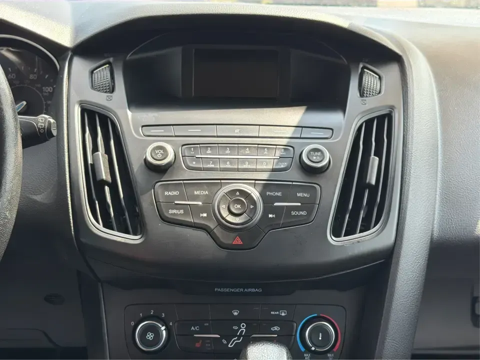 2018 Ford Focus SE (1FADP3K27JL) with an 2L I-4 gasoline direct injection engine, Automatic transmission, located at 4508 South Dixie Dr, Moraine, OH, 45439, (937) 908-9800, 39.689976, -84.218452 - Need a practical, fun-to-drive hatchback for the daily commute down South Dixie Drive, quick errands near Dayton Mall, or an easy weekend escape to Carillon Historical Park? This 2018 Ford Focus SE in eye-catching Hot Pepper Red Metallic Tinted Clearcoat fits real life in Moraine, Ohio-compact enoug- Photo#13
