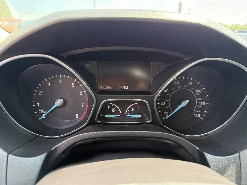 2018 Ford Focus SE (1FADP3K27JL) with an 2L I-4 gasoline direct injection engine, Automatic transmission, located at 4508 South Dixie Dr, Moraine, OH, 45439, (937) 908-9800, 39.689976, -84.218452 - Need a practical, fun-to-drive hatchback for the daily commute down South Dixie Drive, quick errands near Dayton Mall, or an easy weekend escape to Carillon Historical Park? This 2018 Ford Focus SE in eye-catching Hot Pepper Red Metallic Tinted Clearcoat fits real life in Moraine, Ohio-compact enoug- Photo#15