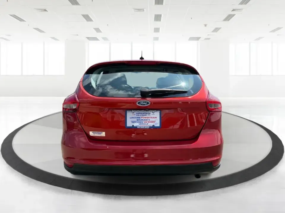 2018 Ford Focus SE (1FADP3K27JL) with an 2L I-4 gasoline direct injection engine, Automatic transmission, located at 401 Woodman Dr, Riverside, OH, 45431, (937) 908-9800, 39.760899, -84.123421 - Need a smart, efficient ride for the daily commute, campus runs, or quick weekend getaways around the Miami Valley? This 2018 Ford Focus SE in eye-catching Hot Pepper Red Metallic Tinted Clearcoat is a practical hatchback-style choice that fits real life-easy to park in busy lots, comfortable for fi- Photo#3