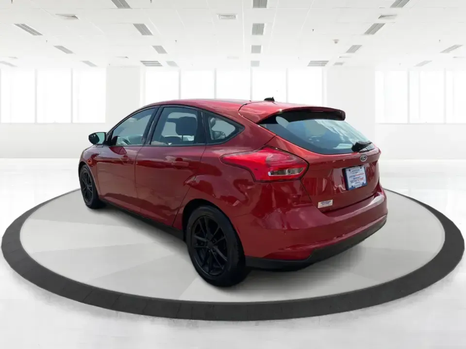 2018 Ford Focus SE (1FADP3K27JL) with an 2L I-4 gasoline direct injection engine, Automatic transmission, located at 401 Woodman Dr, Riverside, OH, 45431, (937) 908-9800, 39.760899, -84.123421 - Need a smart, efficient ride for the daily commute, campus runs, or quick weekend getaways around the Miami Valley? This 2018 Ford Focus SE in eye-catching Hot Pepper Red Metallic Tinted Clearcoat is a practical hatchback-style choice that fits real life-easy to park in busy lots, comfortable for fi- Photo#4