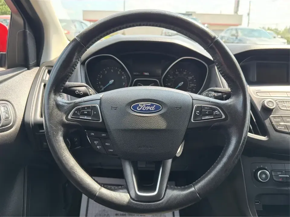 2018 Ford Focus SE (1FADP3K27JL) with an 2L I-4 gasoline direct injection engine, Automatic transmission, located at 401 Woodman Dr, Riverside, OH, 45431, (937) 908-9800, 39.760899, -84.123421 - Need a smart, efficient ride for the daily commute, campus runs, or quick weekend getaways around the Miami Valley? This 2018 Ford Focus SE in eye-catching Hot Pepper Red Metallic Tinted Clearcoat is a practical hatchback-style choice that fits real life-easy to park in busy lots, comfortable for fi- Photo#16