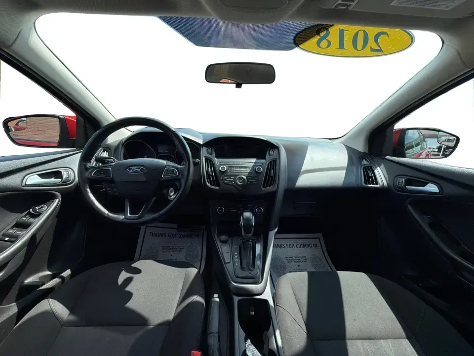 2018 Ford Focus SE (1FADP3K27JL) with an 2L I-4 gasoline direct injection engine, Automatic transmission, located at 401 Woodman Dr, Riverside, OH, 45431, (937) 908-9800, 39.760899, -84.123421 - Need a smart, efficient ride for the daily commute, campus runs, or quick weekend getaways around the Miami Valley? This 2018 Ford Focus SE in eye-catching Hot Pepper Red Metallic Tinted Clearcoat is a practical hatchback-style choice that fits real life-easy to park in busy lots, comfortable for fi- Photo#20