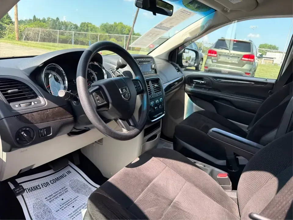 2014 Dodge Grand Caravan SE (2C4RDGBG0ER) with an 3.6L V-6 DOHC engine, located at 1099 N County Rd 25A , Troy, OH, 45373, (937) 908-9800, 40.057079, -84.212883 - Need a reliable, budget-friendly minivan that can handle school drop-offs, grocery runs, and weekend road trips without complicating your routine? This 2014 Dodge Grand Caravan SE in Maximum Steel Metallic Clearcoat is a practical, family-first van with the space and everyday comfort that make life- Photo#9