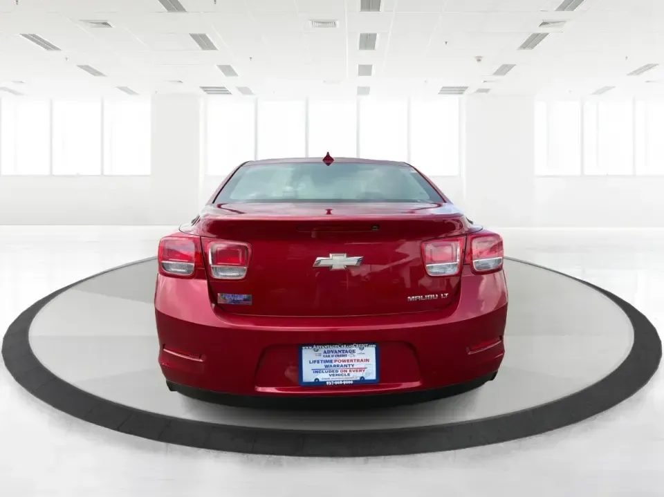 2013 Chevrolet Malibu 1LT (1G11C5SA3DF) with an ECOTEC 2.5L I-4 gasoline direct injection engine, located at 8750 N County Rd 25A, Piqua, OH, 45356, (937) 908-9800, 40.164391, -84.232513 - Need a dependable sedan for the daily commute up I75, school drop-offs, or quick weekend getaways to Miami Bend Park? This 2013 Chevrolet Malibu 1LT in eye-catching Crystal Red Tintcoat fits real-life Ohio driving with a comfortable cabin, smart safety tech, and efficient power-making it a practical- Photo#3
