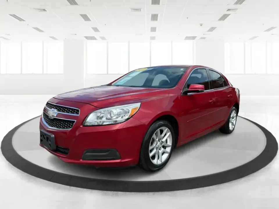2013 Chevrolet Malibu 1LT (1G11C5SA3DF) with an ECOTEC 2.5L I-4 gasoline direct injection engine, located at 8750 N County Rd 25A, Piqua, OH, 45356, (937) 908-9800, 40.164391, -84.232513 - Need a dependable sedan for the daily commute up I75, school drop-offs, or quick weekend getaways to Miami Bend Park? This 2013 Chevrolet Malibu 1LT in eye-catching Crystal Red Tintcoat fits real-life Ohio driving with a comfortable cabin, smart safety tech, and efficient power-making it a practical- Photo#8