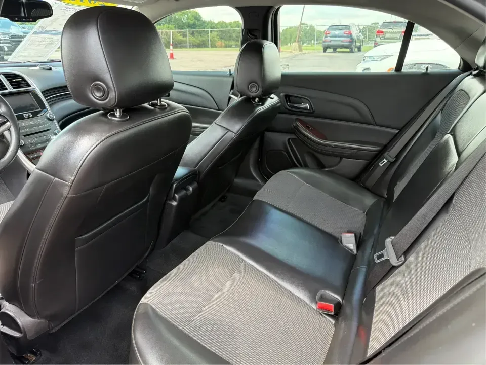 2013 Chevrolet Malibu 1LT (1G11C5SA3DF) with an ECOTEC 2.5L I-4 gasoline direct injection engine, located at 8750 N County Rd 25A, Piqua, OH, 45356, (937) 908-9800, 40.164391, -84.232513 - Need a dependable sedan for the daily commute up I75, school drop-offs, or quick weekend getaways to Miami Bend Park? This 2013 Chevrolet Malibu 1LT in eye-catching Crystal Red Tintcoat fits real-life Ohio driving with a comfortable cabin, smart safety tech, and efficient power-making it a practical- Photo#10
