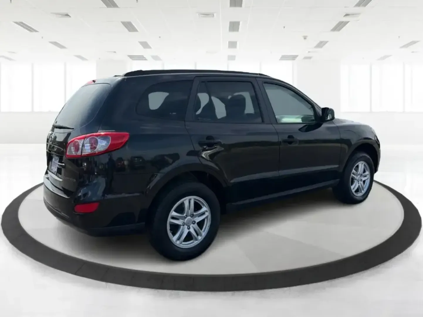 2011 Hyundai Santa Fe GL(Middle-low grade) (5XYZG3AB9BG) with an 2.4L I-4 DOHC engine, located at 1099 N County Rd 25A , Troy, OH, 45373, (937) 908-9800, 40.057079, -84.212883 - Weekend getaways to Hocking Hills, daily commutes down I75, or the after-school shuttle with sports gear in the back-this 2011 Hyundai Santa Fe GL is the kind of SUV that fits real life in and around Troy. With its practical size, confident road manners, and versatile cargo space, it's a smart pick- Photo#2