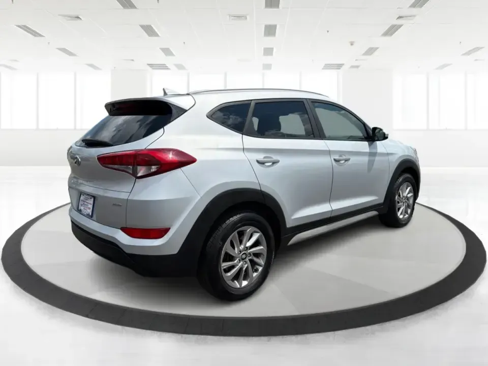 2018 Hyundai Tucson SE Pop, SE Plus, Eco, Sport, Value, Ultimate Base/Ultimate (KM8J3CA46JU) with an Nu 2L I-4 gasoline direct injection engine, Automatic transmission, located at 401 Woodman Dr, Riverside, OH, 45431, (937) 908-9800, 39.760899, -84.123421 - Weekend road trips to Yellow Springs, snowy commutes on I-675, and everyday school-and-grocery runs around Riverside all call for an SUV that feels confident, comfortable, and easy to live with-and this 2018 Hyundai Tucson is built for exactly that kind of real-life driving. Finished in sleek Molten- Photo#2