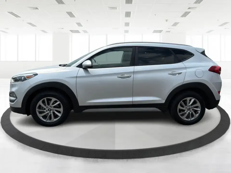 2018 Hyundai Tucson SE Pop, SE Plus, Eco, Sport, Value, Ultimate Base/Ultimate (KM8J3CA46JU) with an Nu 2L I-4 gasoline direct injection engine, Automatic transmission, located at 401 Woodman Dr, Riverside, OH, 45431, (937) 908-9800, 39.760899, -84.123421 - Weekend road trips to Yellow Springs, snowy commutes on I-675, and everyday school-and-grocery runs around Riverside all call for an SUV that feels confident, comfortable, and easy to live with-and this 2018 Hyundai Tucson is built for exactly that kind of real-life driving. Finished in sleek Molten- Photo#5