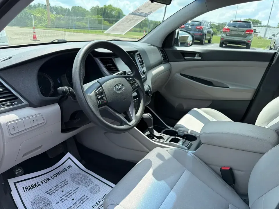 2018 Hyundai Tucson SE Pop, SE Plus, Eco, Sport, Value, Ultimate Base/Ultimate (KM8J3CA46JU) with an Nu 2L I-4 gasoline direct injection engine, Automatic transmission, located at 401 Woodman Dr, Riverside, OH, 45431, (937) 908-9800, 39.760899, -84.123421 - Weekend road trips to Yellow Springs, snowy commutes on I-675, and everyday school-and-grocery runs around Riverside all call for an SUV that feels confident, comfortable, and easy to live with-and this 2018 Hyundai Tucson is built for exactly that kind of real-life driving. Finished in sleek Molten- Photo#9