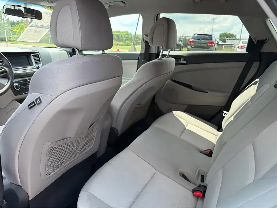 2018 Hyundai Tucson SE Pop, SE Plus, Eco, Sport, Value, Ultimate Base/Ultimate (KM8J3CA46JU) with an Nu 2L I-4 gasoline direct injection engine, Automatic transmission, located at 401 Woodman Dr, Riverside, OH, 45431, (937) 908-9800, 39.760899, -84.123421 - Weekend road trips to Yellow Springs, snowy commutes on I-675, and everyday school-and-grocery runs around Riverside all call for an SUV that feels confident, comfortable, and easy to live with-and this 2018 Hyundai Tucson is built for exactly that kind of real-life driving. Finished in sleek Molten- Photo#10