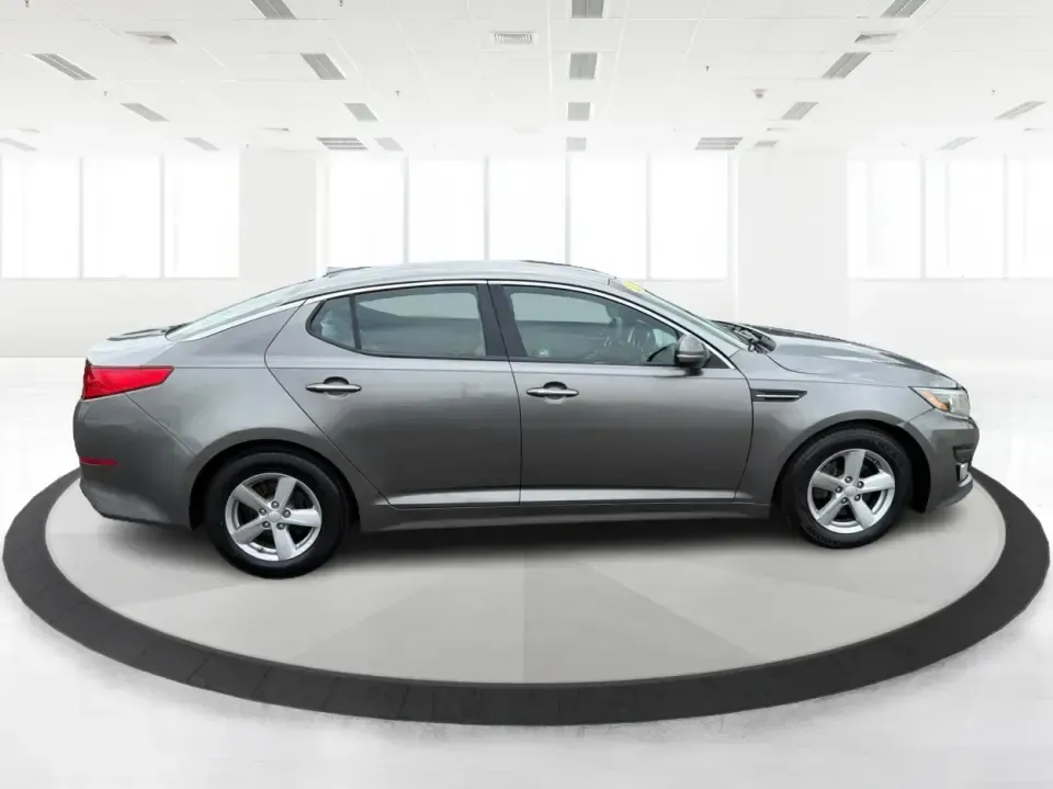 2014 Kia Optima 2.4 LX STD/Conv (5XXGM4A77EG) with an Theta II 2.4L I-4 gasoline direct injection engine, located at 8750 N County Rd 25A, Piqua, OH, 45356, (937) 908-9800, 40.164391, -84.232513 - Picture your next week: a smooth, fuel-sipping commute down I-75, a quick run to Miami Valley Centre Mall, and a comfortable evening drive through downtown Piqua-without giving up style or practicality. This 2014 Kia Optima 2.4 LX (STD/Conv) in Satin Metal is a smart sedan for real life: roomy enoug- Photo#1