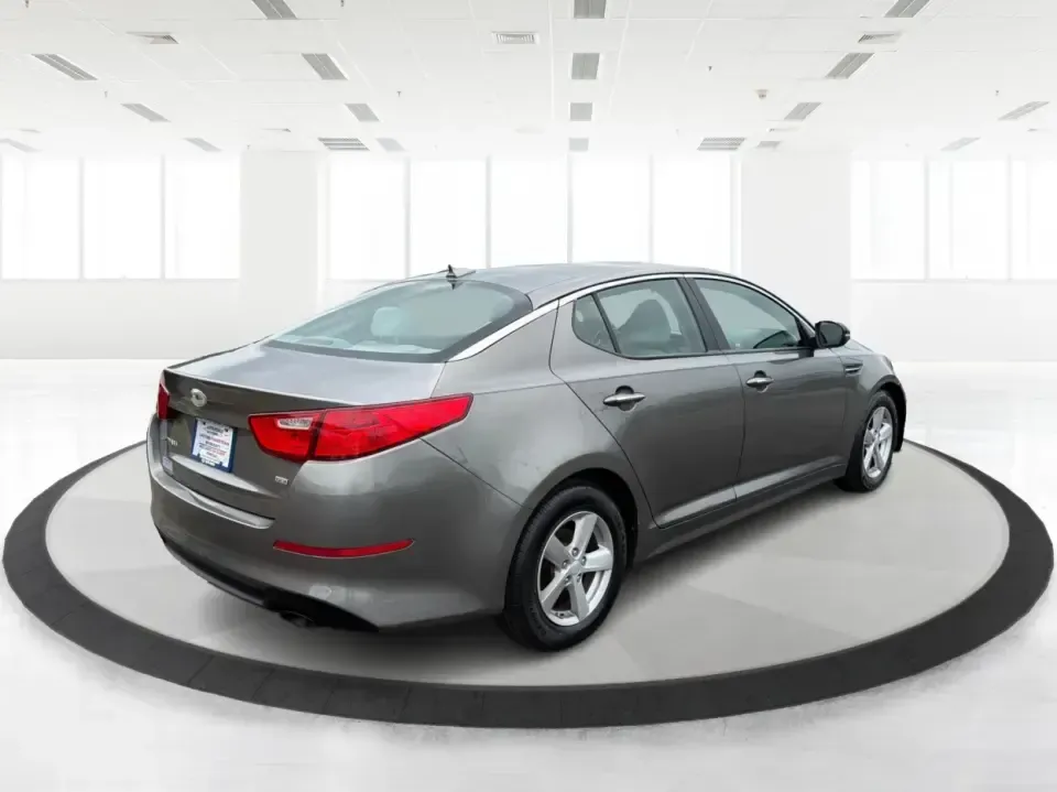 2014 Kia Optima 2.4 LX STD/Conv (5XXGM4A77EG) with an Theta II 2.4L I-4 gasoline direct injection engine, located at 8750 N County Rd 25A, Piqua, OH, 45356, (937) 908-9800, 40.164391, -84.232513 - Picture your next week: a smooth, fuel-sipping commute down I-75, a quick run to Miami Valley Centre Mall, and a comfortable evening drive through downtown Piqua-without giving up style or practicality. This 2014 Kia Optima 2.4 LX (STD/Conv) in Satin Metal is a smart sedan for real life: roomy enoug- Photo#2