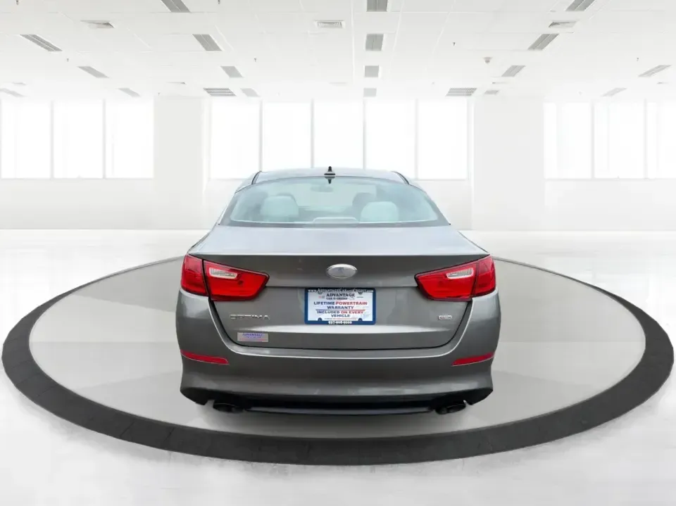 2014 Kia Optima 2.4 LX STD/Conv (5XXGM4A77EG) with an Theta II 2.4L I-4 gasoline direct injection engine, located at 8750 N County Rd 25A, Piqua, OH, 45356, (937) 908-9800, 40.164391, -84.232513 - Picture your next week: a smooth, fuel-sipping commute down I-75, a quick run to Miami Valley Centre Mall, and a comfortable evening drive through downtown Piqua-without giving up style or practicality. This 2014 Kia Optima 2.4 LX (STD/Conv) in Satin Metal is a smart sedan for real life: roomy enoug- Photo#3