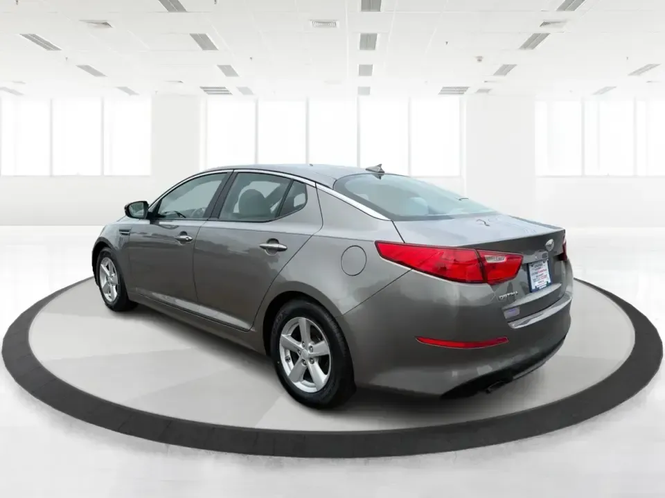 2014 Kia Optima 2.4 LX STD/Conv (5XXGM4A77EG) with an Theta II 2.4L I-4 gasoline direct injection engine, located at 8750 N County Rd 25A, Piqua, OH, 45356, (937) 908-9800, 40.164391, -84.232513 - Picture your next week: a smooth, fuel-sipping commute down I-75, a quick run to Miami Valley Centre Mall, and a comfortable evening drive through downtown Piqua-without giving up style or practicality. This 2014 Kia Optima 2.4 LX (STD/Conv) in Satin Metal is a smart sedan for real life: roomy enoug- Photo#4