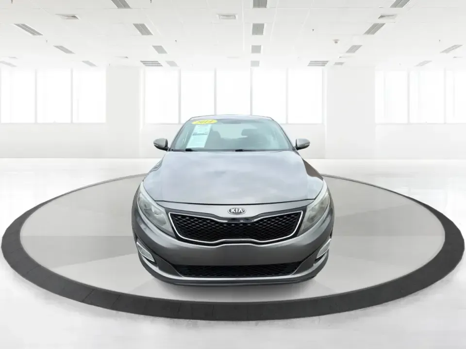 2014 Kia Optima 2.4 LX STD/Conv (5XXGM4A77EG) with an Theta II 2.4L I-4 gasoline direct injection engine, located at 8750 N County Rd 25A, Piqua, OH, 45356, (937) 908-9800, 40.164391, -84.232513 - Picture your next week: a smooth, fuel-sipping commute down I-75, a quick run to Miami Valley Centre Mall, and a comfortable evening drive through downtown Piqua-without giving up style or practicality. This 2014 Kia Optima 2.4 LX (STD/Conv) in Satin Metal is a smart sedan for real life: roomy enoug- Photo#7