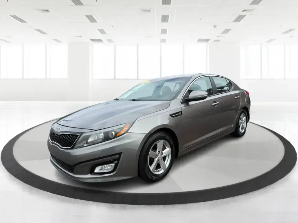 2014 Kia Optima 2.4 LX STD/Conv (5XXGM4A77EG) with an Theta II 2.4L I-4 gasoline direct injection engine, located at 8750 N County Rd 25A, Piqua, OH, 45356, (937) 908-9800, 40.164391, -84.232513 - Picture your next week: a smooth, fuel-sipping commute down I-75, a quick run to Miami Valley Centre Mall, and a comfortable evening drive through downtown Piqua-without giving up style or practicality. This 2014 Kia Optima 2.4 LX (STD/Conv) in Satin Metal is a smart sedan for real life: roomy enoug- Photo#8