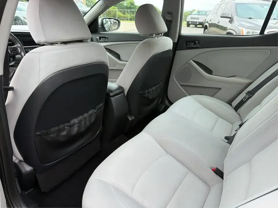 2014 Kia Optima 2.4 LX STD/Conv (5XXGM4A77EG) with an Theta II 2.4L I-4 gasoline direct injection engine, located at 8750 N County Rd 25A, Piqua, OH, 45356, (937) 908-9800, 40.164391, -84.232513 - Picture your next week: a smooth, fuel-sipping commute down I-75, a quick run to Miami Valley Centre Mall, and a comfortable evening drive through downtown Piqua-without giving up style or practicality. This 2014 Kia Optima 2.4 LX (STD/Conv) in Satin Metal is a smart sedan for real life: roomy enoug- Photo#10
