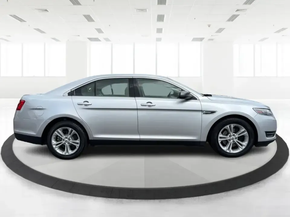 2014 Ford Taurus SEL (1FAHP2E84EG) with an EcoBoost 2L I-4 gasoline direct injection engine, located at 401 Woodman Dr, Riverside, OH, 45431, (937) 908-9800, 39.760899, -84.123421 - Need a comfortable, confident commuter that can handle I75 traffic during the week and still feel relaxed on a Dayton-to-Cincinnati road trip on the weekend? This 2014 Ford Taurus SEL in Ingot Silver Metallic is a smart pick for drivers who want full-size sedan space, modern tech, and a smooth ride-- Photo#1