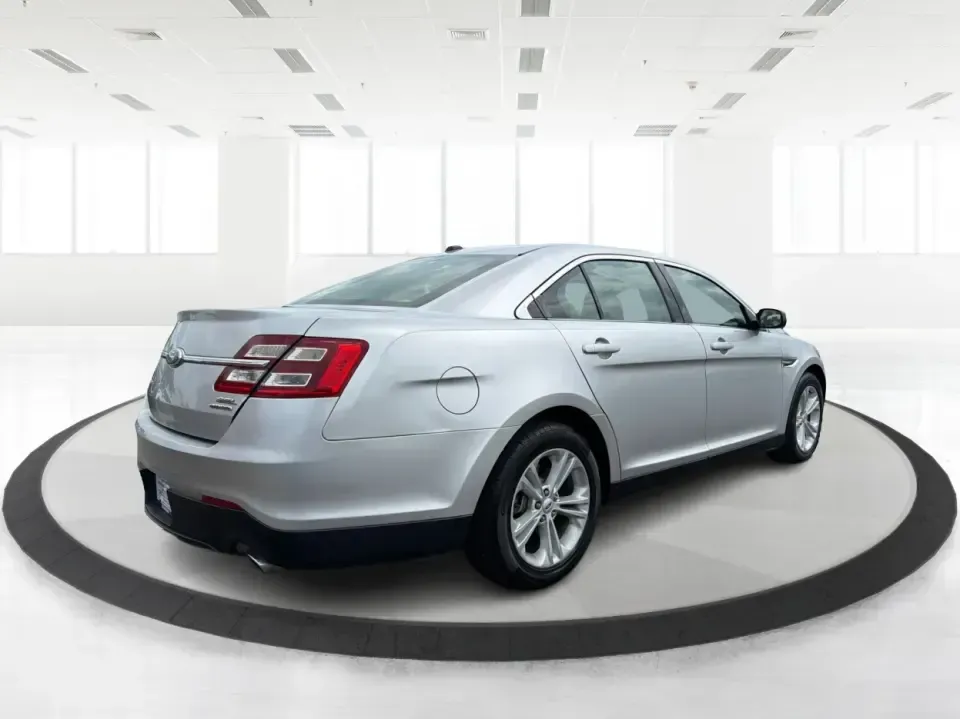 2014 Ford Taurus SEL (1FAHP2E84EG) with an EcoBoost 2L I-4 gasoline direct injection engine, located at 401 Woodman Dr, Riverside, OH, 45431, (937) 908-9800, 39.760899, -84.123421 - Need a comfortable, confident commuter that can handle I75 traffic during the week and still feel relaxed on a Dayton-to-Cincinnati road trip on the weekend? This 2014 Ford Taurus SEL in Ingot Silver Metallic is a smart pick for drivers who want full-size sedan space, modern tech, and a smooth ride-- Photo#2