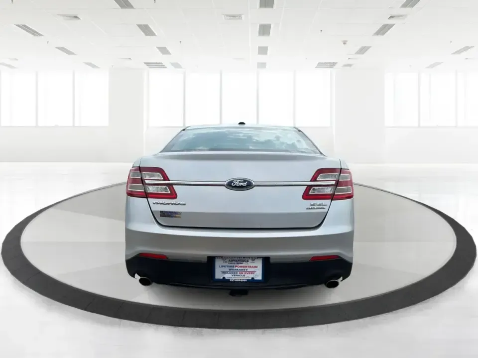 2014 Ford Taurus SEL (1FAHP2E84EG) with an EcoBoost 2L I-4 gasoline direct injection engine, located at 401 Woodman Dr, Riverside, OH, 45431, (937) 908-9800, 39.760899, -84.123421 - Need a comfortable, confident commuter that can handle I75 traffic during the week and still feel relaxed on a Dayton-to-Cincinnati road trip on the weekend? This 2014 Ford Taurus SEL in Ingot Silver Metallic is a smart pick for drivers who want full-size sedan space, modern tech, and a smooth ride-- Photo#3