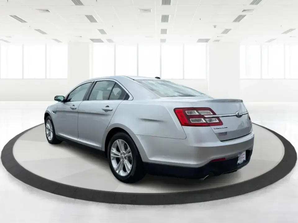 2014 Ford Taurus SEL (1FAHP2E84EG) with an EcoBoost 2L I-4 gasoline direct injection engine, located at 401 Woodman Dr, Riverside, OH, 45431, (937) 908-9800, 39.760899, -84.123421 - Need a comfortable, confident commuter that can handle I75 traffic during the week and still feel relaxed on a Dayton-to-Cincinnati road trip on the weekend? This 2014 Ford Taurus SEL in Ingot Silver Metallic is a smart pick for drivers who want full-size sedan space, modern tech, and a smooth ride-- Photo#4