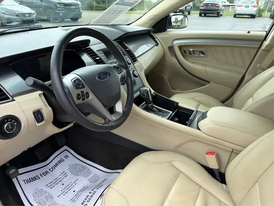 2014 Ford Taurus SEL (1FAHP2E84EG) with an EcoBoost 2L I-4 gasoline direct injection engine, located at 401 Woodman Dr, Riverside, OH, 45431, (937) 908-9800, 39.760899, -84.123421 - Need a comfortable, confident commuter that can handle I75 traffic during the week and still feel relaxed on a Dayton-to-Cincinnati road trip on the weekend? This 2014 Ford Taurus SEL in Ingot Silver Metallic is a smart pick for drivers who want full-size sedan space, modern tech, and a smooth ride-- Photo#9