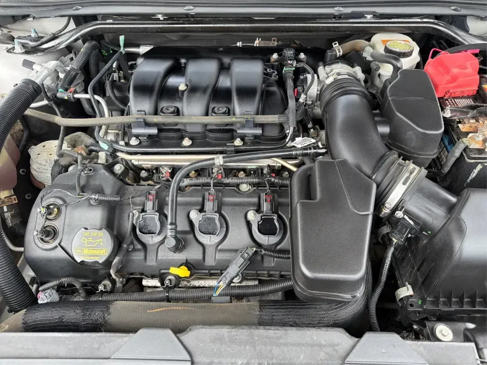 2014 Ford Taurus SEL (1FAHP2E84EG) with an EcoBoost 2L I-4 gasoline direct injection engine, located at 401 Woodman Dr, Riverside, OH, 45431, (937) 908-9800, 39.760899, -84.123421 - Need a comfortable, confident commuter that can handle I75 traffic during the week and still feel relaxed on a Dayton-to-Cincinnati road trip on the weekend? This 2014 Ford Taurus SEL in Ingot Silver Metallic is a smart pick for drivers who want full-size sedan space, modern tech, and a smooth ride-- Photo#11