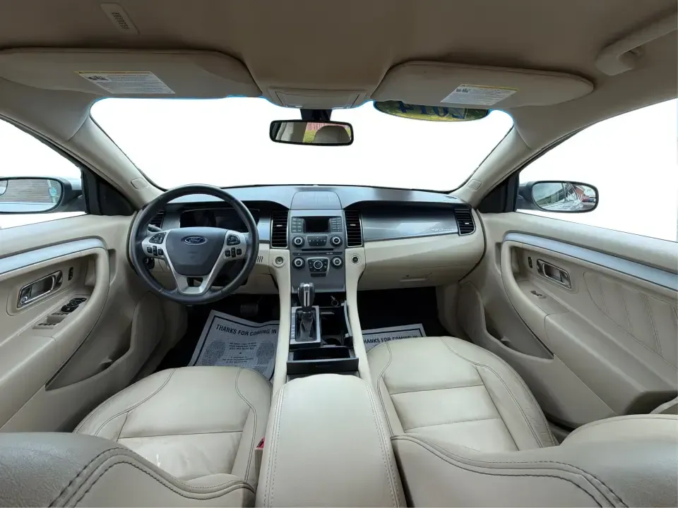 2014 Ford Taurus SEL (1FAHP2E84EG) with an EcoBoost 2L I-4 gasoline direct injection engine, located at 401 Woodman Dr, Riverside, OH, 45431, (937) 908-9800, 39.760899, -84.123421 - Need a comfortable, confident commuter that can handle I75 traffic during the week and still feel relaxed on a Dayton-to-Cincinnati road trip on the weekend? This 2014 Ford Taurus SEL in Ingot Silver Metallic is a smart pick for drivers who want full-size sedan space, modern tech, and a smooth ride-- Photo#22