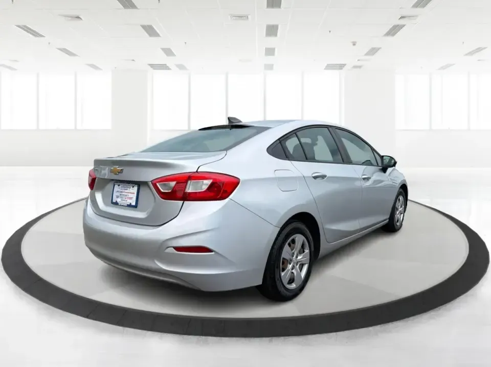 2016 Chevrolet Cruze LS Auto (1G1BC5SM4G7) with an 1.4L L4 DOHC 16V TURBO engine, 6-Speed Automatic transmission, located at 8750 N County Rd 25A, Piqua, OH, 45356, (937) 908-9800, 40.164391, -84.232513 - Make your daily drive simpler-and a lot more affordable-with a sedan that's built for real life in West Central Ohio. Whether you're commuting to Troy, running errands around Piqua, or planning a weekend loop up I75 toward Dayton, this 2016 Chevrolet Cruze LS Auto delivers the kind of easy-to-live-w- Photo#2