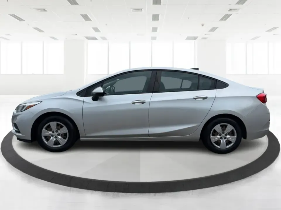 2016 Chevrolet Cruze LS Auto (1G1BC5SM4G7) with an 1.4L L4 DOHC 16V TURBO engine, 6-Speed Automatic transmission, located at 8750 N County Rd 25A, Piqua, OH, 45356, (937) 908-9800, 40.164391, -84.232513 - Make your daily drive simpler-and a lot more affordable-with a sedan that's built for real life in West Central Ohio. Whether you're commuting to Troy, running errands around Piqua, or planning a weekend loop up I75 toward Dayton, this 2016 Chevrolet Cruze LS Auto delivers the kind of easy-to-live-w- Photo#5